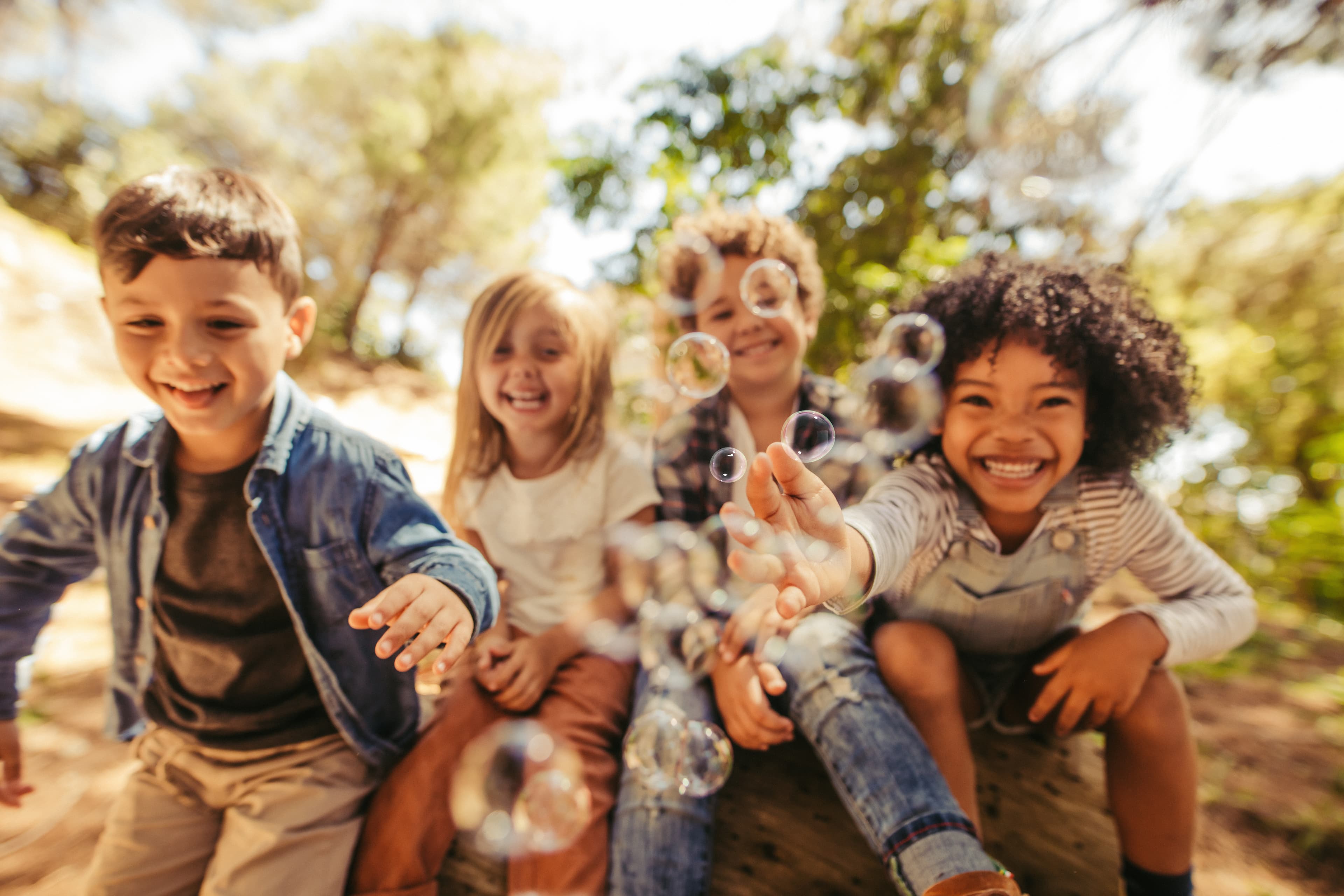 Children exploring a natural outdoor environment